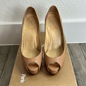 Nude patent leather Christian Louboutin peep toe heels